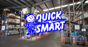 Quick Smart Products logo in front of our Advance Chemical warehouse.